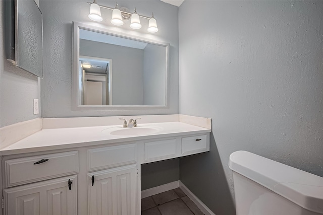 2110 Wilcrest Dr Unit 140, Houston, TX 77042 - half bathroom featuring vanity and tile patterned floors