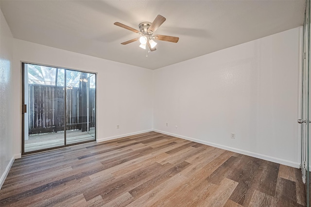 2110 Wilcrest Dr Unit 140, Houston, TX 77042 - empty room with wood finished floors and a ceiling fan