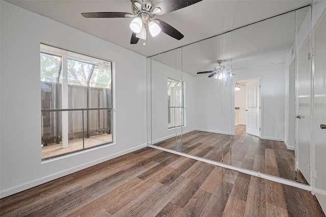 2110 Wilcrest Dr Unit 140, Houston, TX 77042 - unfurnished room with wood finished floors and ceiling fan