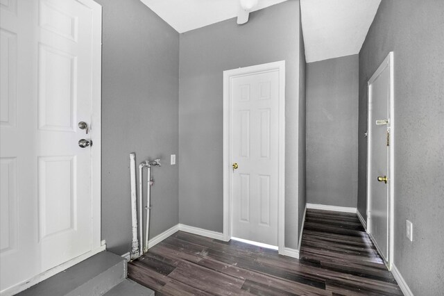 2303 Wright Blvd, Baytown, TX 77520 - foyer entrance with dark wood-type flooring and baseboards
