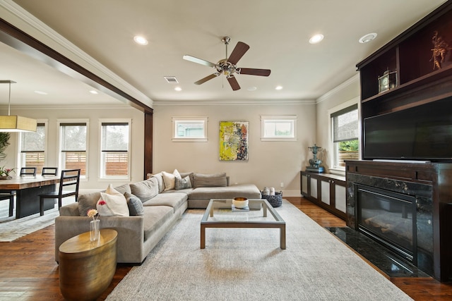 959 W 42nd St, Houston, TX 77018 - living room featuring dark wood-style floors, ceiling fan, recessed lighting, and crown molding