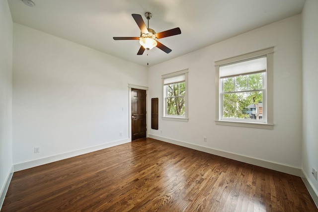 959 W 42nd St, Houston, TX 77018 - unfurnished room with dark wood finished floors, a ceiling fan, and a smoke detector