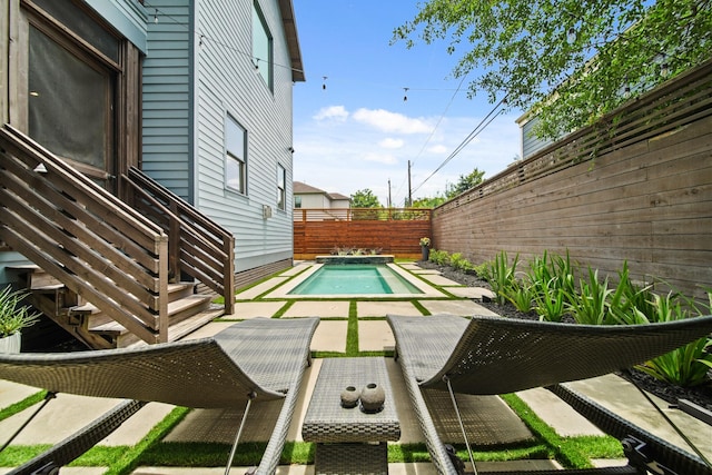959 W 42nd St, Houston, TX 77018 - view of pool with a fenced backyard and a patio