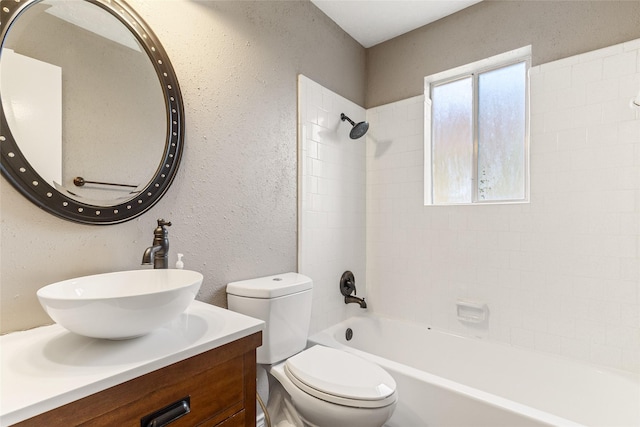 14 Sarita Rd, Angleton, TX 77515 - full bath featuring vanity, a textured wall, and shower / bathtub combination