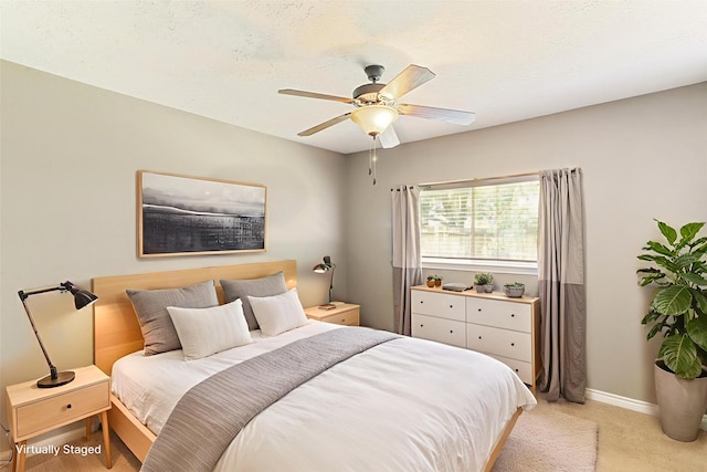 14 Sarita Rd, Angleton, TX 77515 - bedroom with light colored carpet and ceiling fan