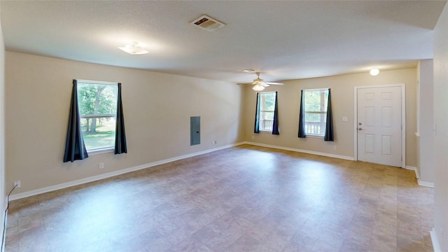 25531 Black St, Splendora, TX 77372 - empty room featuring healthy amount of natural light, light flooring, and a ceiling fan