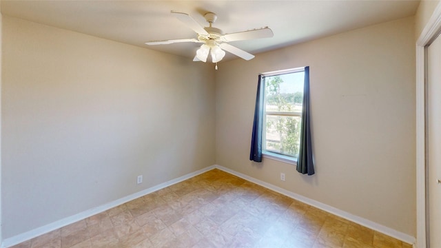 25531 Black St, Splendora, TX 77372 - spare room featuring baseboards and ceiling fan