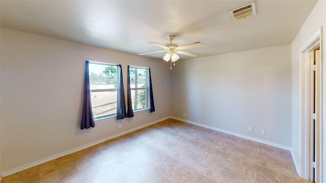 25531 Black St, Splendora, TX 77372 - empty room with a ceiling fan and baseboards