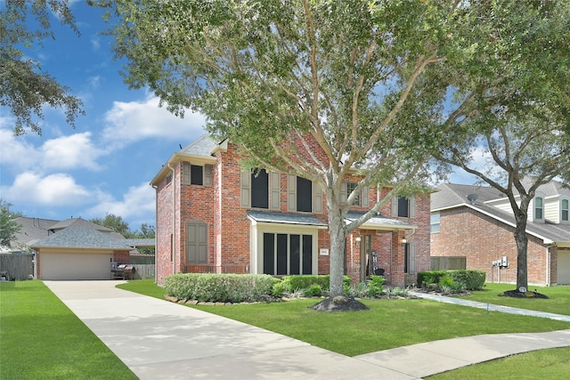 5806 Wilton St, Pearland, TX 77584 - view of front of property with brick siding, a front lawn, and concrete driveway