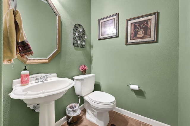 5806 Wilton St, Pearland, TX 77584 - bathroom with tile patterned floors and toilet