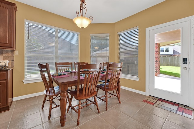 5806 Wilton St, Pearland, TX 77584 - dining room with plenty of natural light and light tile patterned floors