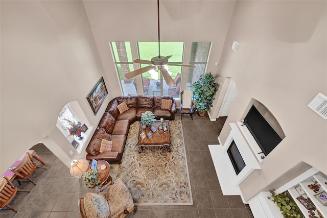 5806 Wilton St, Pearland, TX 77584 - living area with a high ceiling, tile patterned floors, plenty of natural light, and a ceiling fan