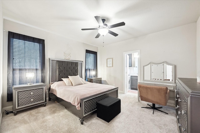 508 Buckhorn St, Sealy, TX 77474 - bedroom featuring light colored carpet, ceiling fan, and connected bathroom