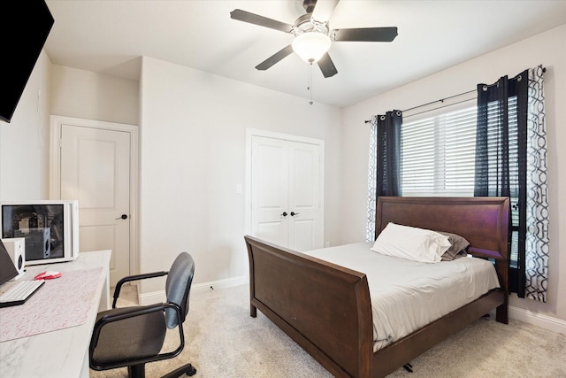 508 Buckhorn St, Sealy, TX 77474 - bedroom with light carpet, ceiling fan, and a closet