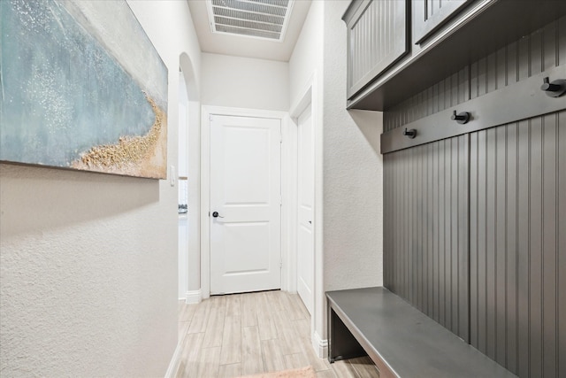 508 Buckhorn St, Sealy, TX 77474 - mudroom featuring a textured wall and wood tiled floors