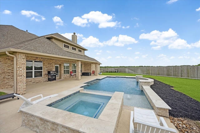 508 Buckhorn St, Sealy, TX 77474 - view of pool featuring a patio area, a fenced backyard, a pool with connected hot tub, and area for grilling