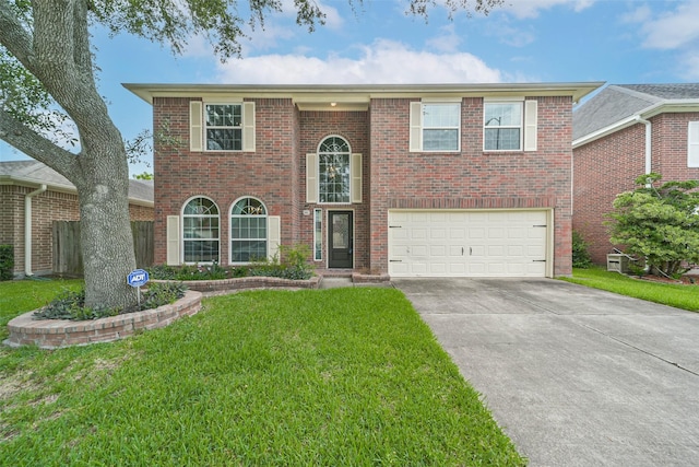 6219 Summerville Ln, Houston, TX 77041 - view of front of house with an attached garage, brick siding, concrete driveway, and a front lawn
