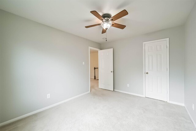 6219 Summerville Ln, Houston, TX 77041 - unfurnished bedroom featuring light colored carpet and a ceiling fan