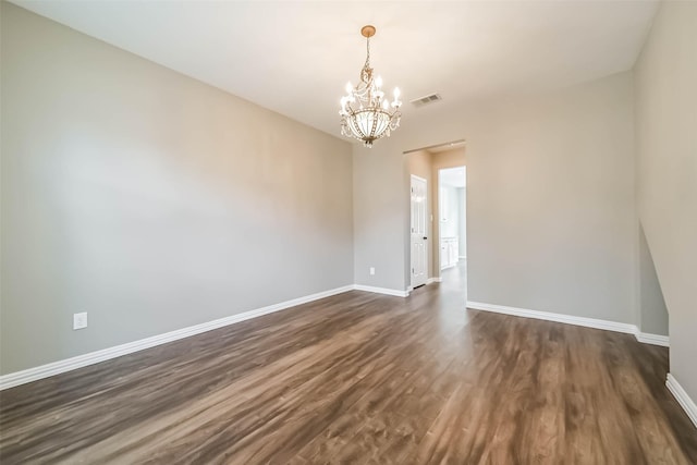 6219 Summerville Ln, Houston, TX 77041 - unfurnished room with a chandelier and dark wood-style flooring