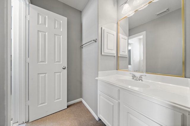 12815 Mimosa Spring Dr, Tomball, TX 77377 - bathroom featuring vanity and baseboards