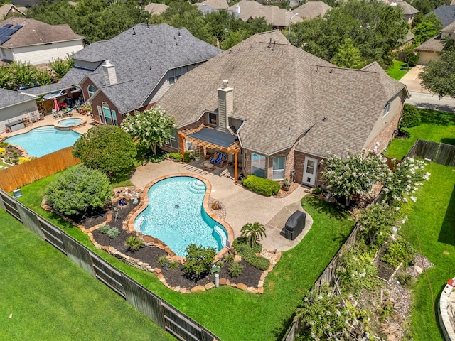 12815 Mimosa Spring Dr, Tomball, TX 77377 - view from above of property with a pool