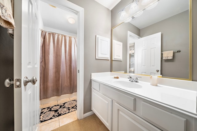 12815 Mimosa Spring Dr, Tomball, TX 77377 - full bathroom with vanity, tile patterned flooring, and a shower with curtain
