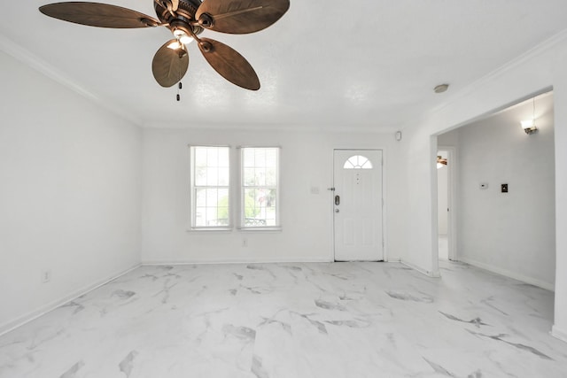 1214 Robert St, Baytown, TX 77521 - entryway featuring crown molding, ceiling fan, and light marble finish flooring