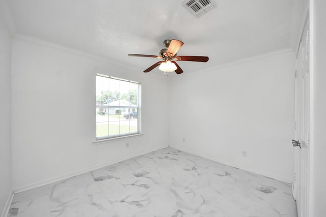 1214 Robert St, Baytown, TX 77521 - unfurnished room with crown molding, a ceiling fan, and marble finish floors