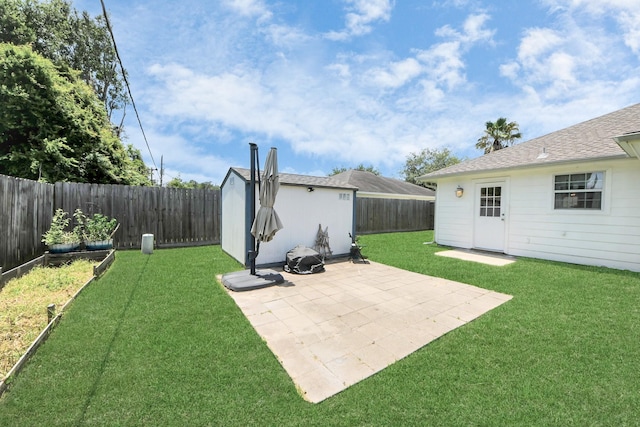 1214 Robert St, Baytown, TX 77521 - fenced backyard featuring a patio and a storage shed