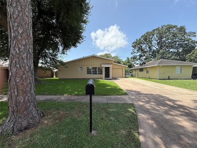 3616 Longwood Dr, Pasadena, TX 77503 - single story home with driveway, a front yard, and a garage