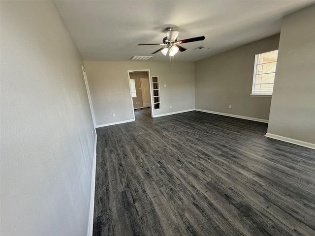 3616 Longwood Dr, Pasadena, TX 77503 - unfurnished room with a ceiling fan and dark wood-type flooring