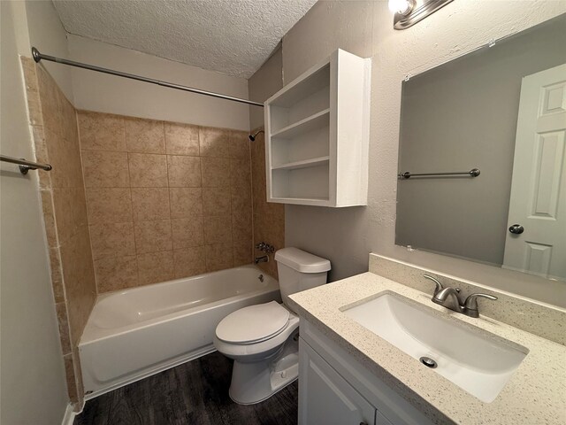 3616 Longwood Dr, Pasadena, TX 77503 - full bath with shower / washtub combination, vanity, a textured ceiling, and wood finished floors