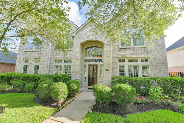 16050 Lockdale Ln, Cypress, TX 77429 - view of front facade featuring brick siding
