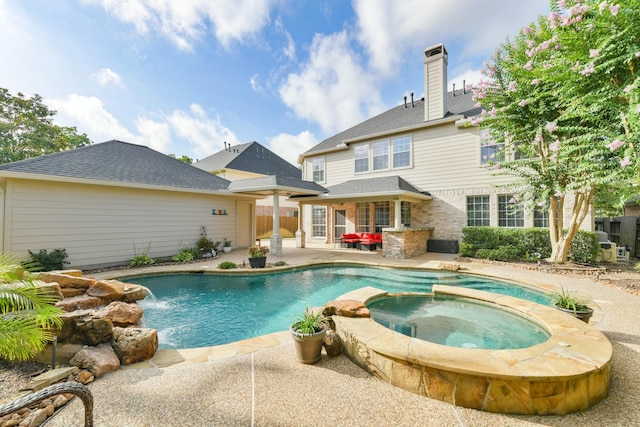 16050 Lockdale Ln, Cypress, TX 77429 - view of pool with a patio area and a pool with connected hot tub