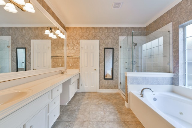 16050 Lockdale Ln, Cypress, TX 77429 - full bathroom featuring ornamental molding, double vanity, a jetted tub, and a stall shower