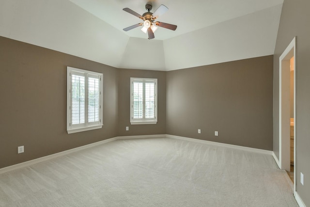 16050 Lockdale Ln, Cypress, TX 77429 - unfurnished room featuring light colored carpet, ceiling fan, and vaulted ceiling