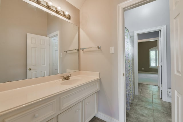 16050 Lockdale Ln, Cypress, TX 77429 - bathroom featuring vanity and a shower with shower curtain