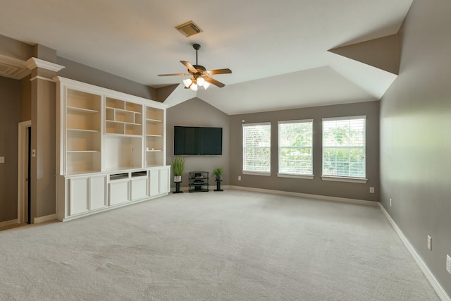 16050 Lockdale Ln, Cypress, TX 77429 - unfurnished living room featuring ceiling fan, vaulted ceiling, and light carpet
