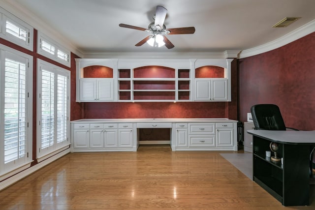 16050 Lockdale Ln, Cypress, TX 77429 - unfurnished office with a ceiling fan, crown molding, light wood-type flooring, and built in study area