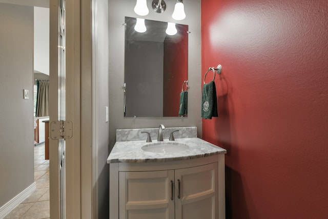 16050 Lockdale Ln, Cypress, TX 77429 - bathroom featuring tile patterned floors and vanity