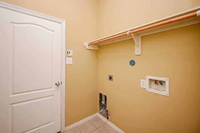6846 Durango Creek Dr, Magnolia, TX 77354 - washroom featuring electric dryer hookup, washer hookup, and light tile patterned flooring