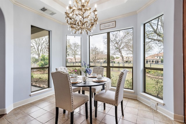 11710 Montmarte Blvd, Houston, TX 77082 - tiled dining area featuring a chandelier, a tray ceiling, and ornamental molding