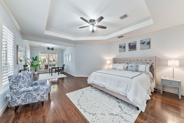 11710 Montmarte Blvd, Houston, TX 77082 - bedroom featuring a raised ceiling, wood finished floors, ornamental molding, and a ceiling fan