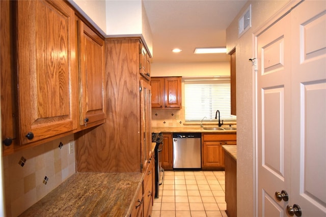 2926 Field Line Dr, Sugar Land, TX 77479 - kitchen featuring appliances with stainless steel finishes, brown cabinetry, tasteful backsplash, light tile patterned floors, and recessed lighting