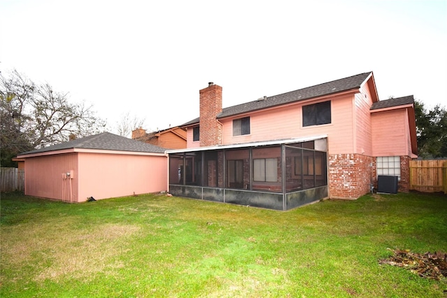 2926 Field Line Dr, Sugar Land, TX 77479 - back of house featuring a sunroom, brick siding, and a chimney
