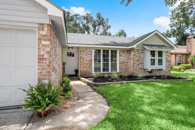 11258 Rousseau Dr, Houston, TX 77065 - view of front of home featuring brick siding, a front yard, a garage, and a shingled roof