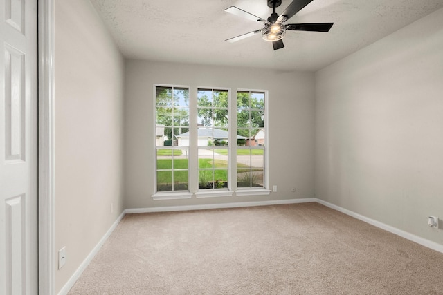 11258 Rousseau Dr, Houston, TX 77065 - spare room featuring carpet, ceiling fan, and a textured ceiling
