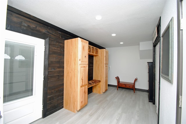 14306 Waterville Way, Houston, TX 77015 - mudroom with light wood finished floors, recessed lighting, wood walls, and a textured ceiling
