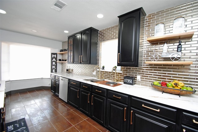 14306 Waterville Way, Houston, TX 77015 - kitchen with open shelves, dishwasher, backsplash, dark cabinetry, and dark tile patterned floors