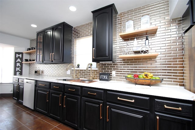 14306 Waterville Way, Houston, TX 77015 - kitchen featuring open shelves, dishwashing machine, dark cabinets, decorative backsplash, and dark tile patterned flooring